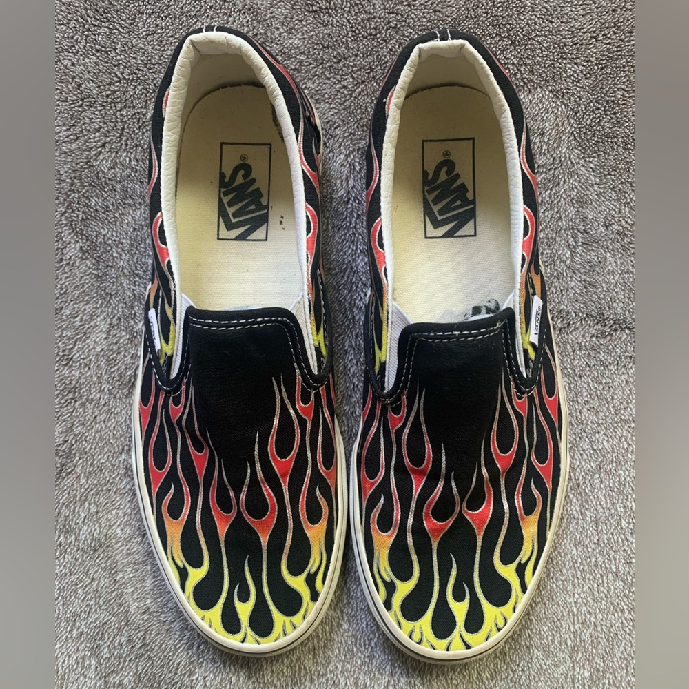 Vans flame slip-on men’s shoes . Size 8.5. Women’s 10 . Pre owned .